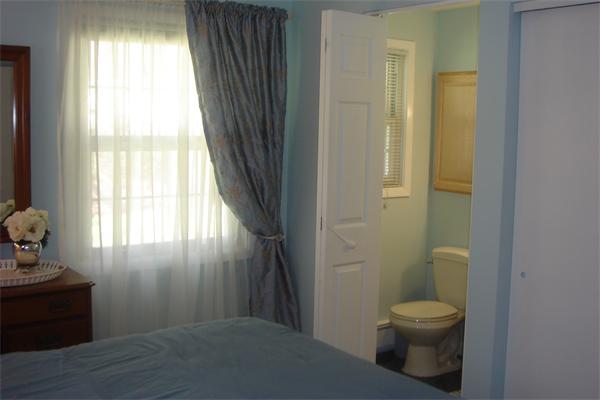57 Eaton Road Framingham, MA 01701 - Photo 12 of 17 a bathroom with a toilet a sink and tub