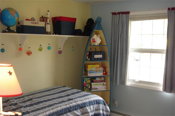 57 Eaton Road Framingham, MA 01701 - Photo 10 of 17 a bedroom with a bed and a window