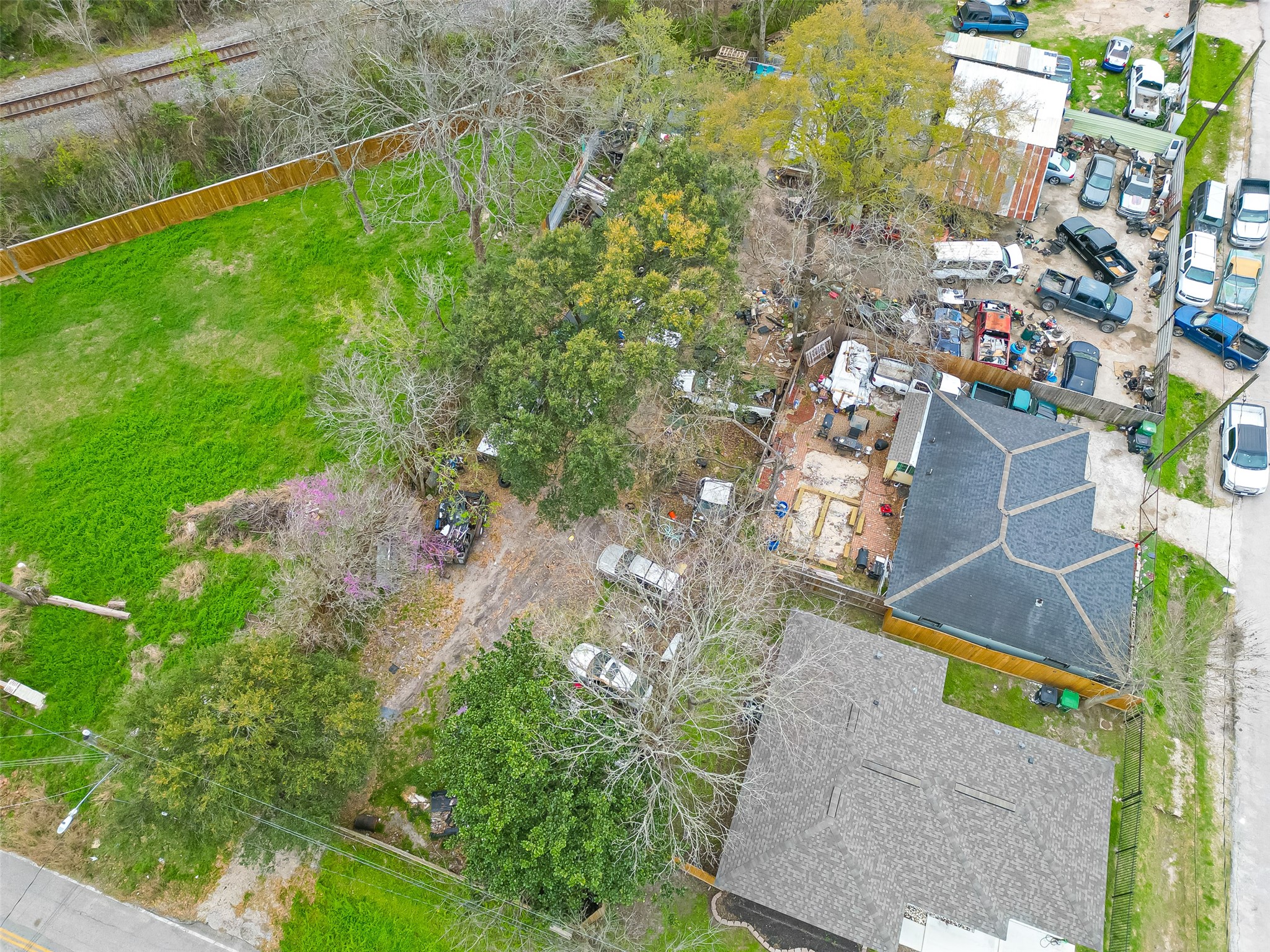 5206 Denmark Street Houston, TX 77016 - Photo 17 of 17 a backyard of a house with lots of green space