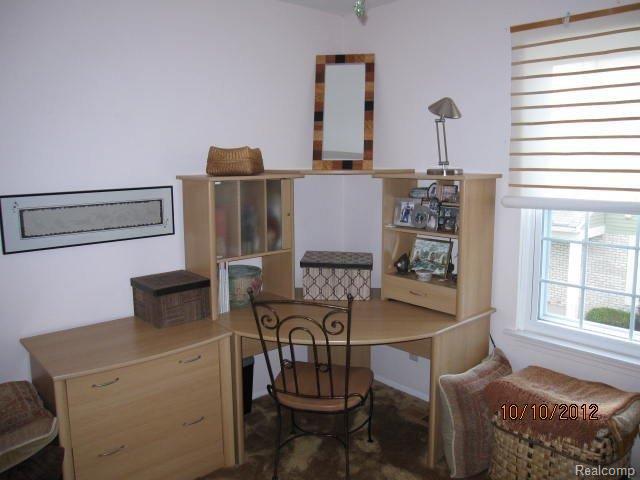 42484 Saratoga Road, Unit 15 Canton, MI 48187 - Photo 13 of 16 Guest bed has lots of light