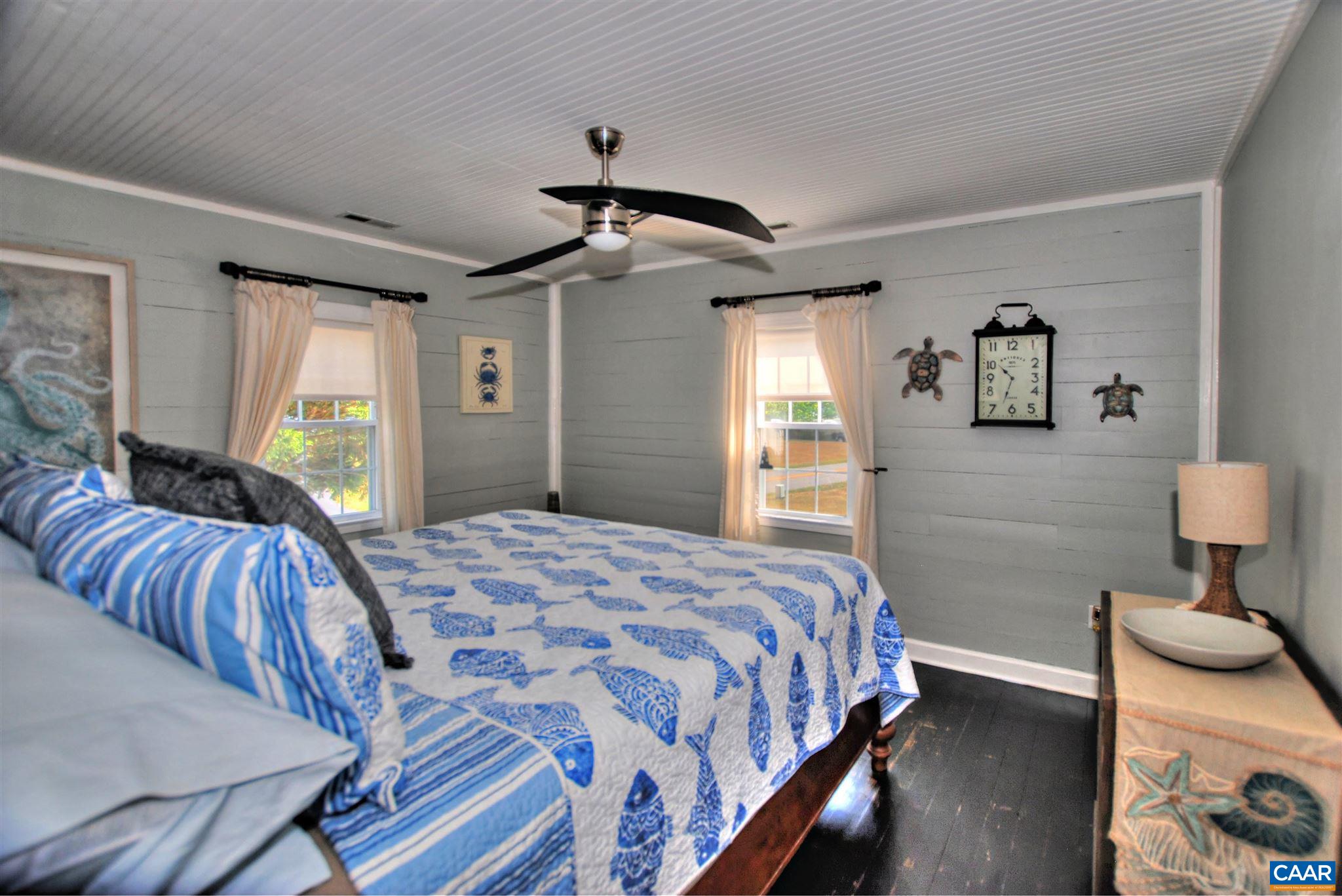 358 Fredericksburg Road Ruckersville, VA 22968 - Photo 13 of 23 a bedroom with bed and window