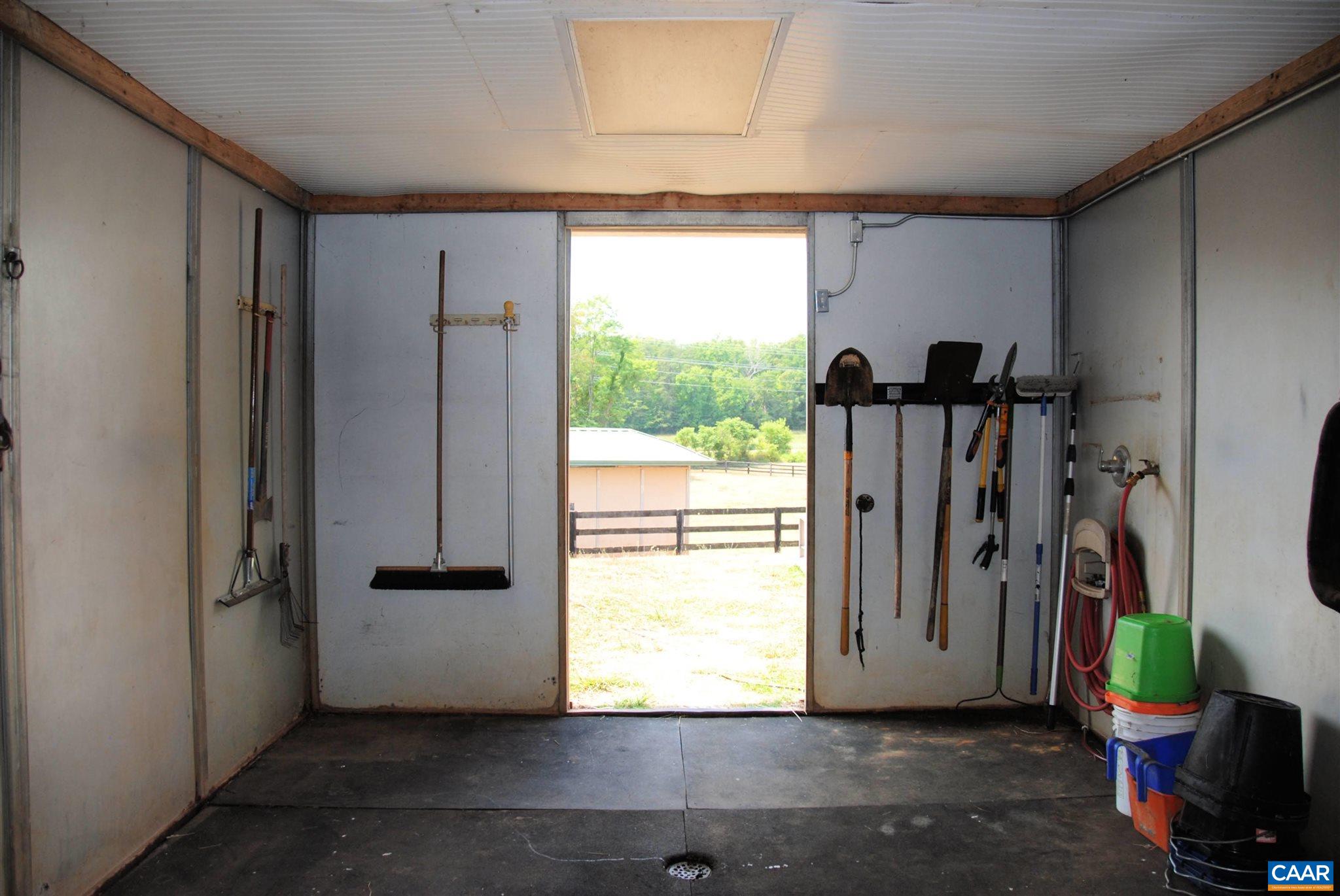 358 Fredericksburg Road Ruckersville, VA 22968 - Photo 5 of 23 a view of a back yard from a room