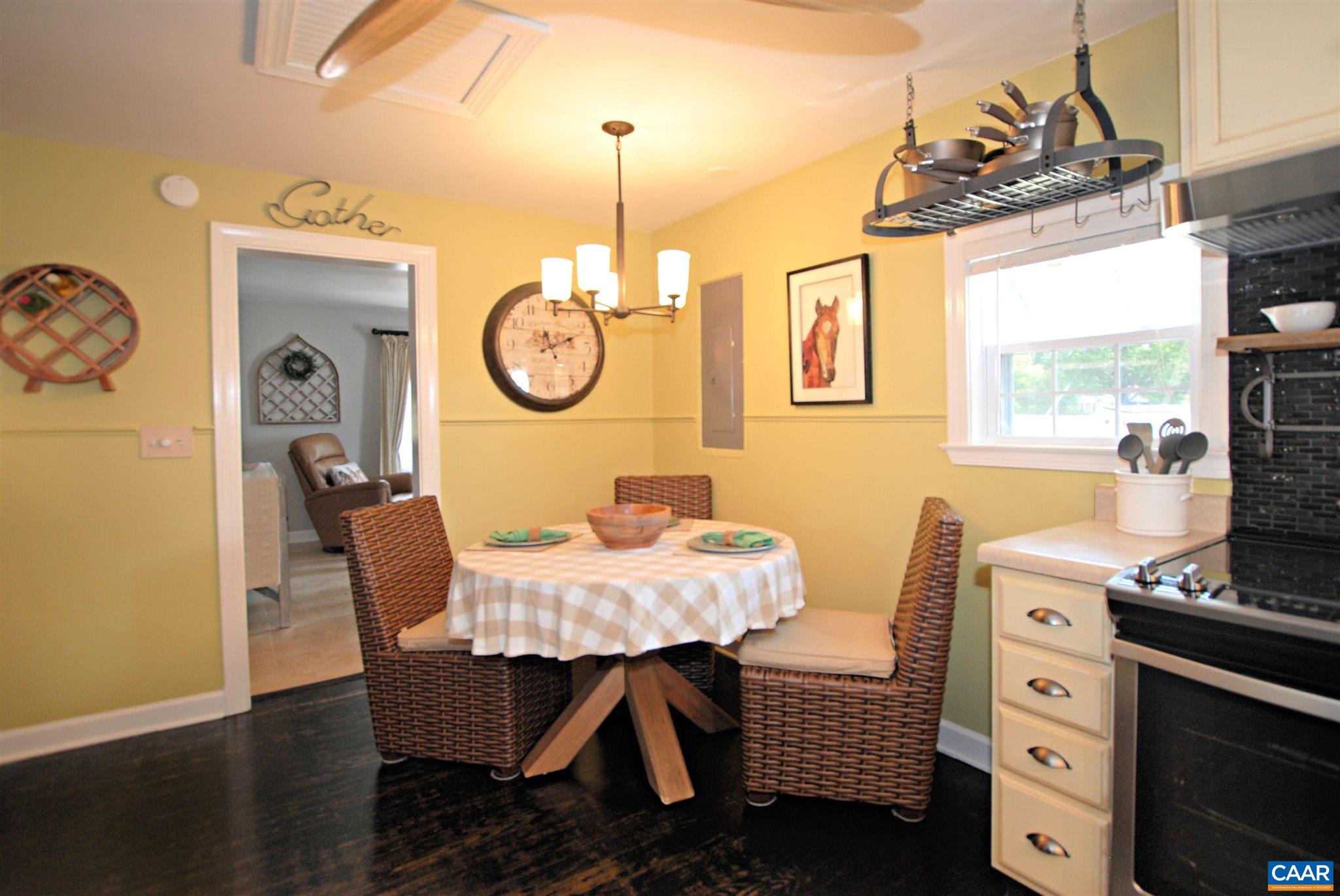 358 Fredericksburg Road Ruckersville, VA 22968 - Photo 9 of 23 a view of a dining room with furniture window and wooden floor
