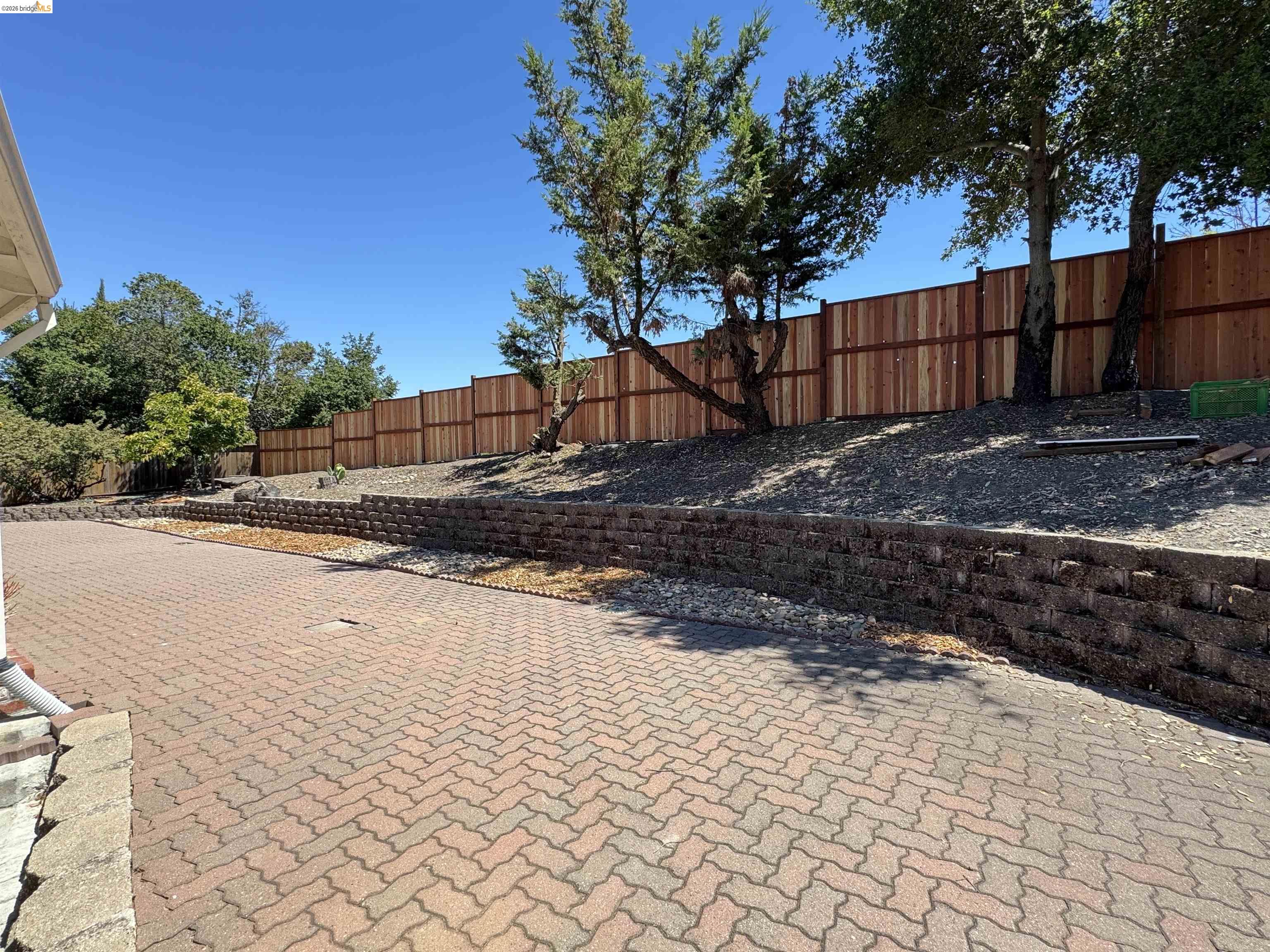 3540 Deer Hill Road Lafayette, CA 94549 - Photo 7 of 20 Fenced backyard with a patio area