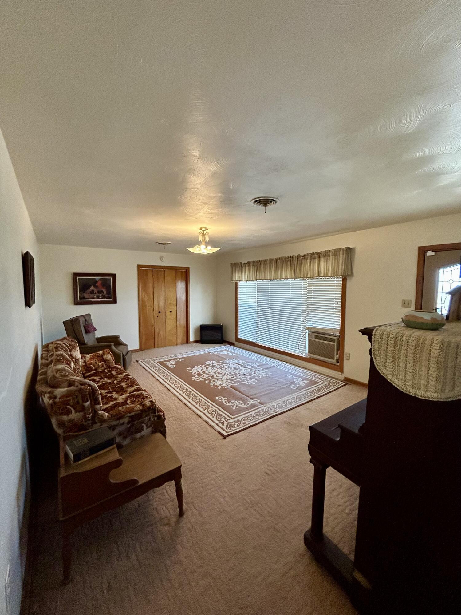 2101 Farm To Market 97 Lockney, TX 79241 - Photo 6 of 35 a bedroom with bed and a window
