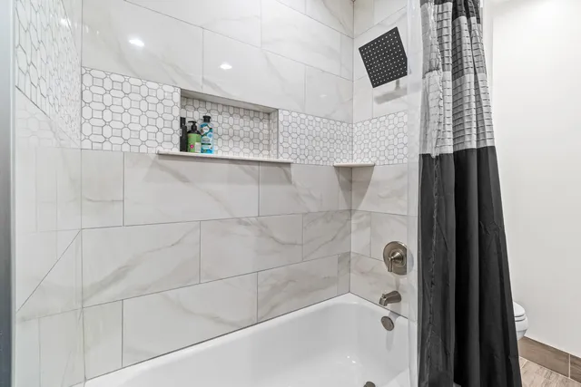 a view of a lake with a garden and trees