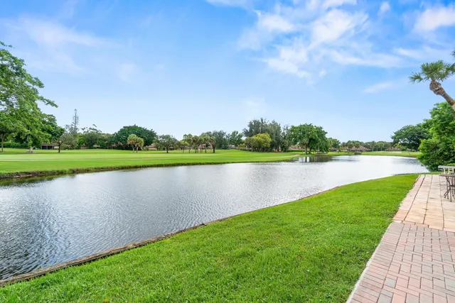 a view of a lake with a big yard