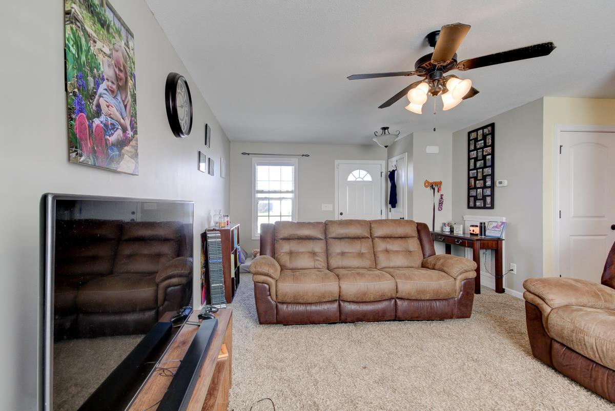 3725 Suiter Road Clarksville, TN 37040 - Photo 3 of 15 a living room with furniture and a fireplace