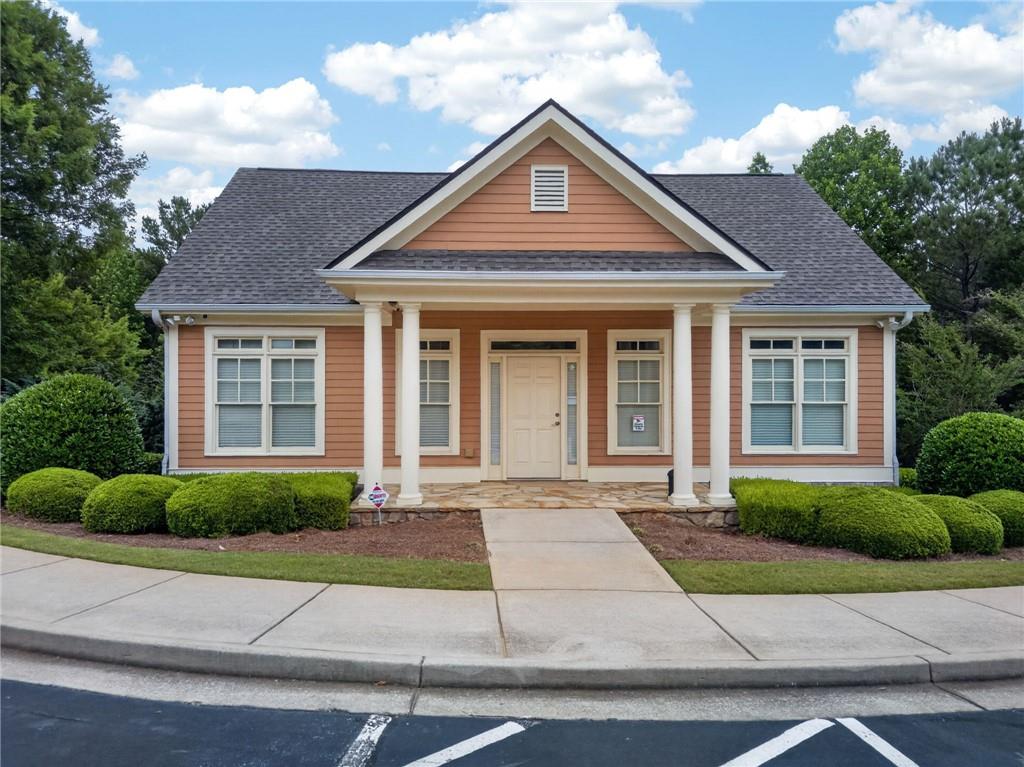 6 Radian Way Dallas, GA 30132 - Photo 7 of 10 front view of a house and a yard