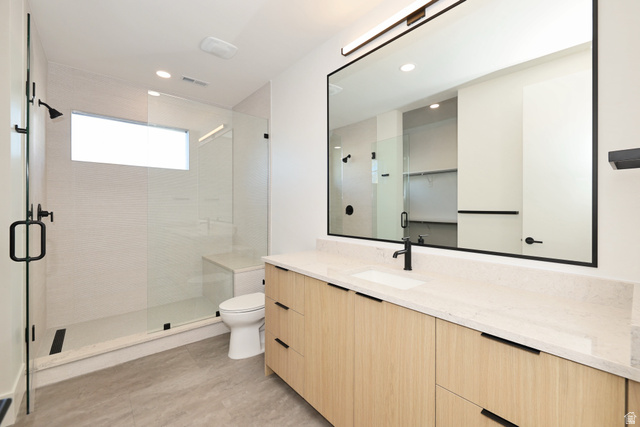 1306 East Victor Lane Draper, UT 84020 - Photo 24 of 60 Bathroom with vanity, a shower stall, and recessed lighting