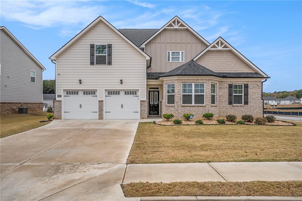 13709 Whitman Lane Covington, GA 30014 - Photo 1 of 36 a view of a house with a yard