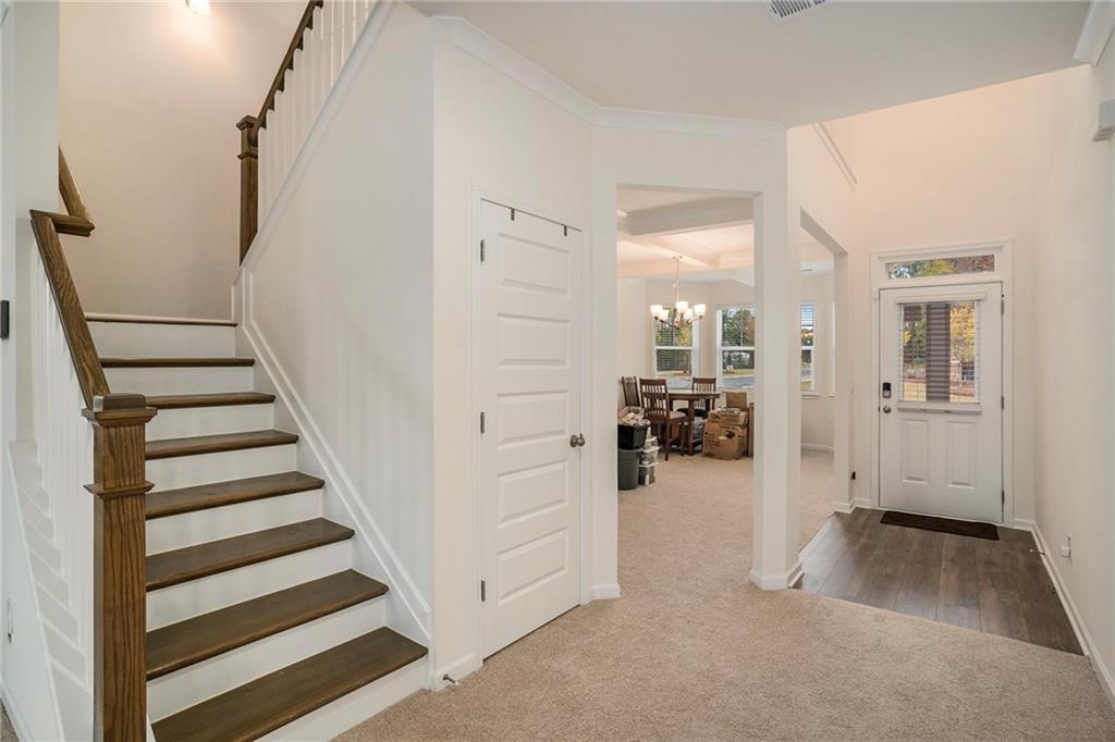 13709 Whitman Lane Covington, GA 30014 - Photo 3 of 36 a view of a livingroom with furniture and stairs
