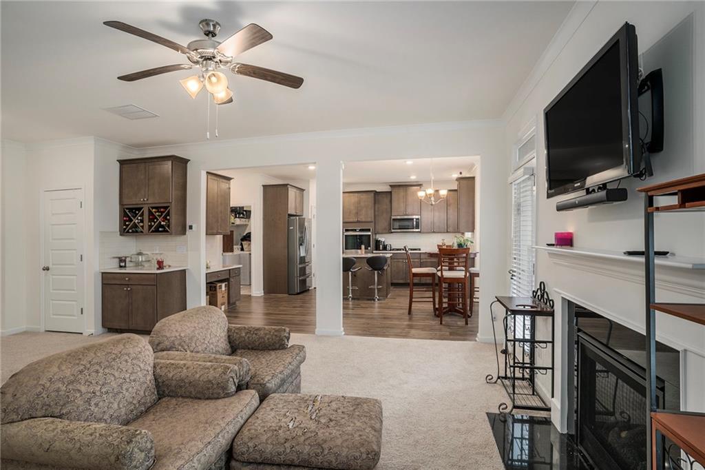 13709 Whitman Lane Covington, GA 30014 - Photo 8 of 36 a living room with furniture and a flat screen tv
