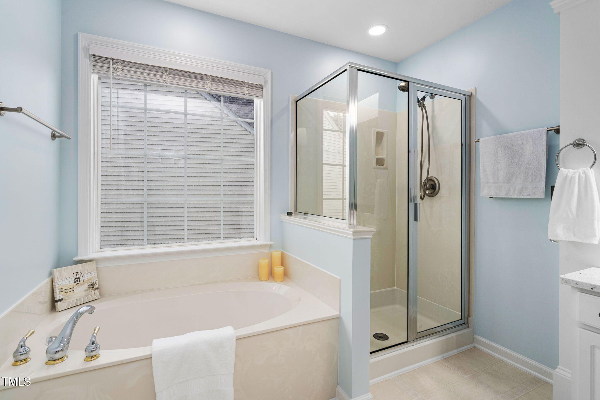 7612 Vista Del Rey Lane Raleigh, NC 27613 - Photo 40 of 73 Frosted Glass For Privacy Over the Garden Tub