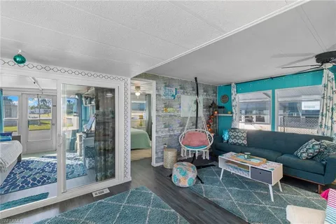 a living room with furniture and a table