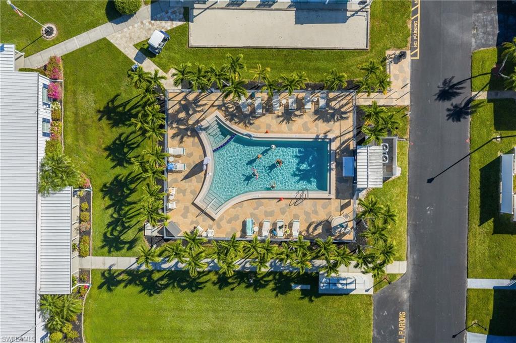 43 Enchanting Boulevard, Unit E43 Naples, FL 34112 - Photo 36 of 36 an aerial view of a house with a garden