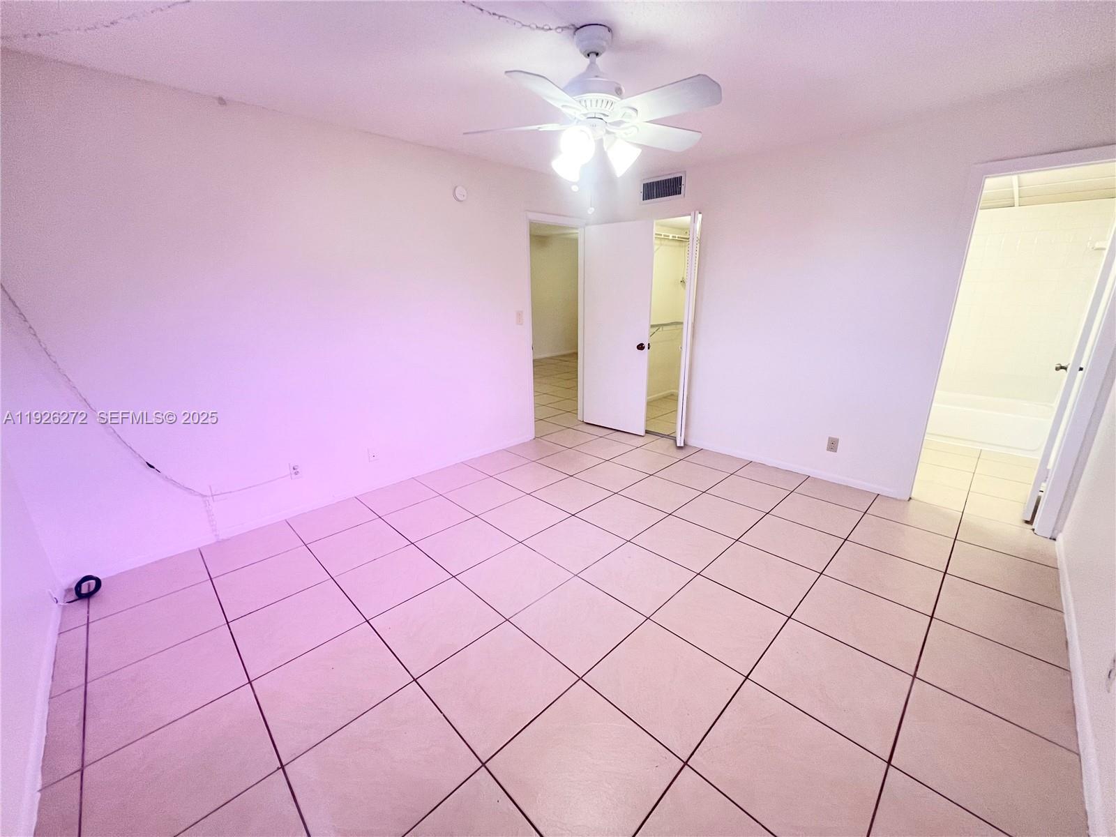 7801 South Colony Circle, Unit 201 Tamarac, FL 33321 - Photo 6 of 10 a view of an empty room