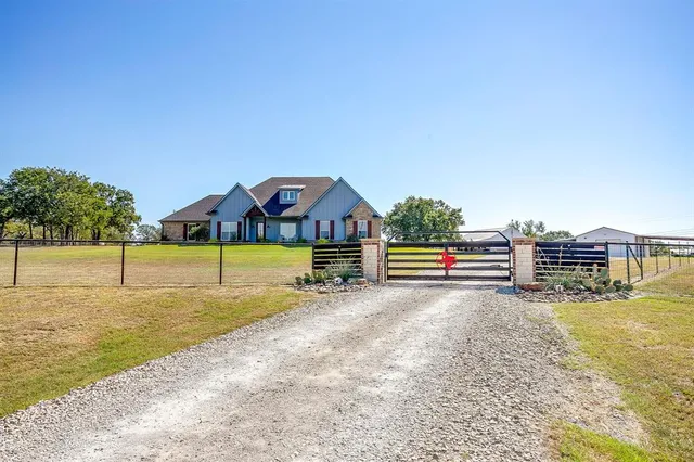 a view of a house with a park