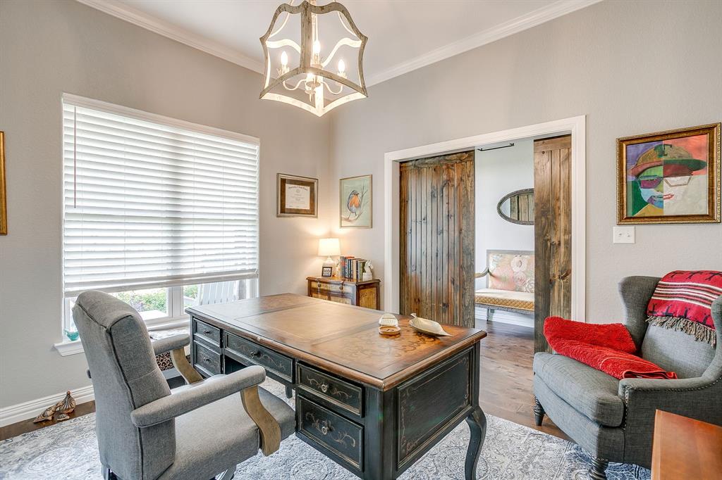 229 Oak Tree Drive Poolville, TX 76487 - Photo 10 of 40 a living room with furniture and a chandelier
