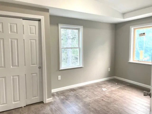 an empty room with windows