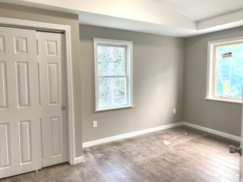 205 West Street, Unit 3 Walpole, MA 02081 - Photo 6 of 12 an empty room with windows