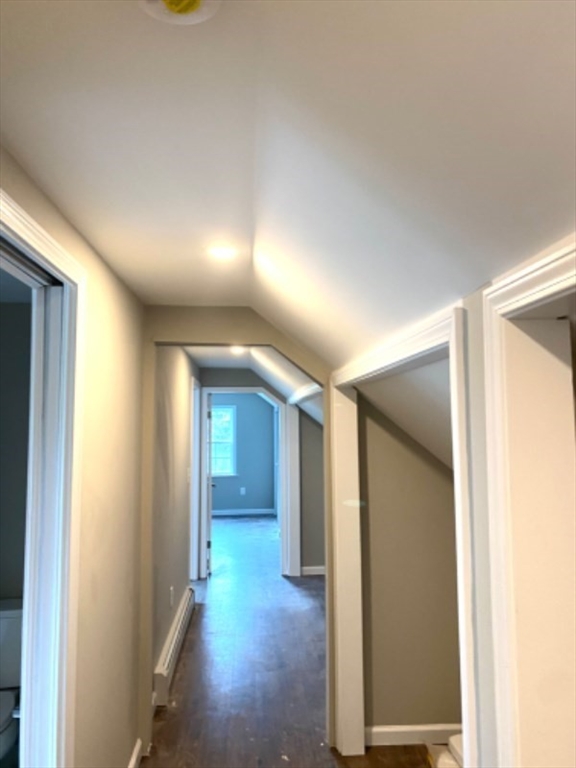 205 West Street, Unit 3 Walpole, MA 02081 - Photo 8 of 12 a view of a hallway with wooden shelves