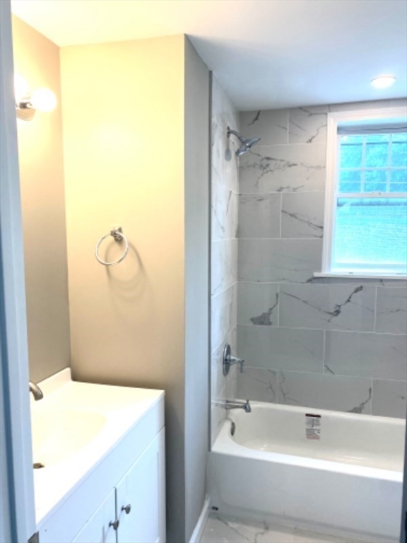 205 West Street, Unit 3 Walpole, MA 02081 - Photo 10 of 12 a bathroom with a bathtub and a shower