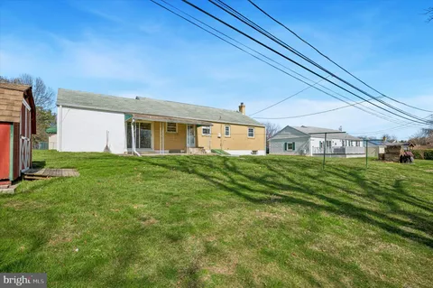 a house view with a garden space