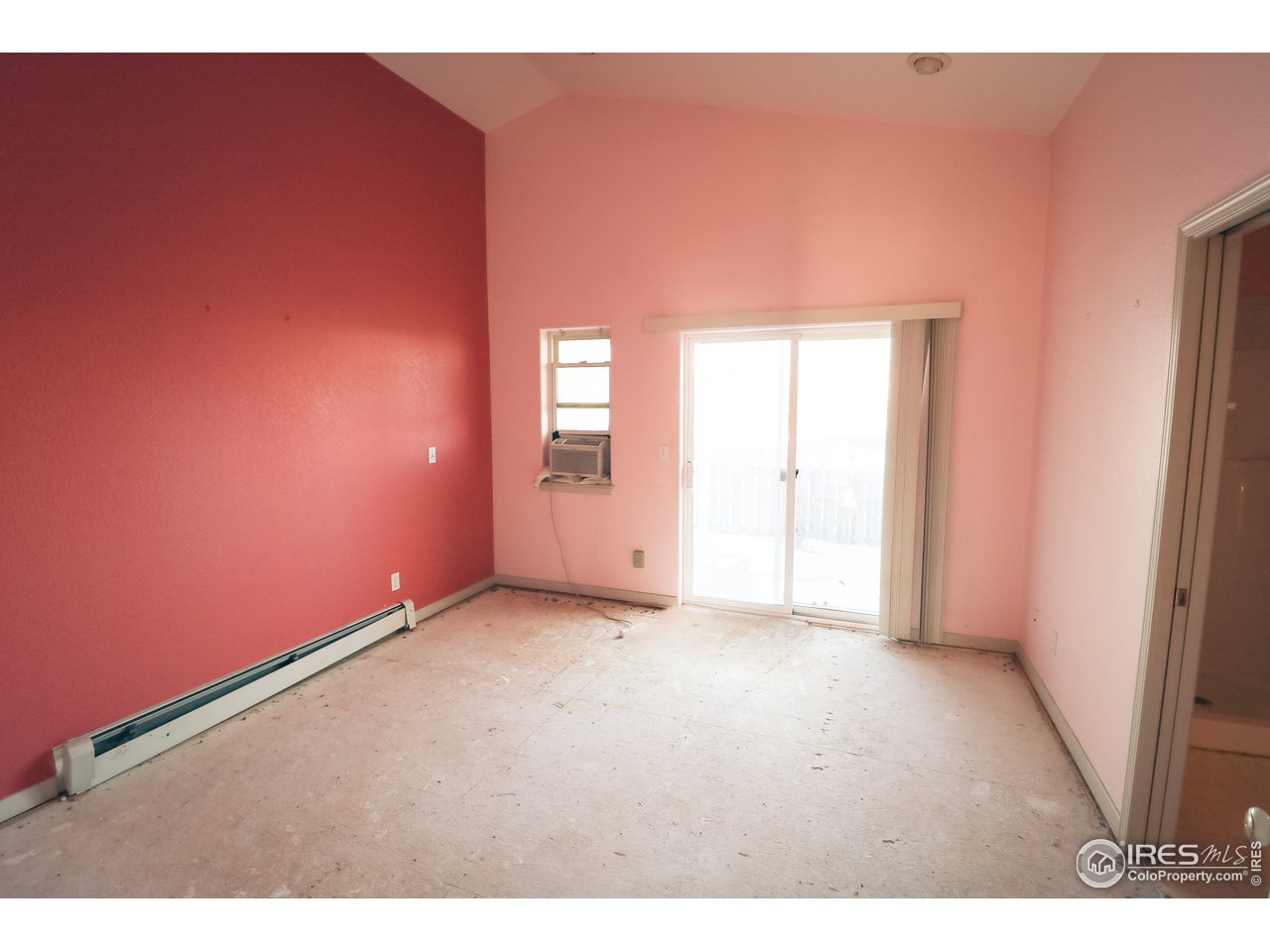 230 South 3rd Street Berthoud, CO 80513 - Photo 11 of 22 a view of an empty room with a window