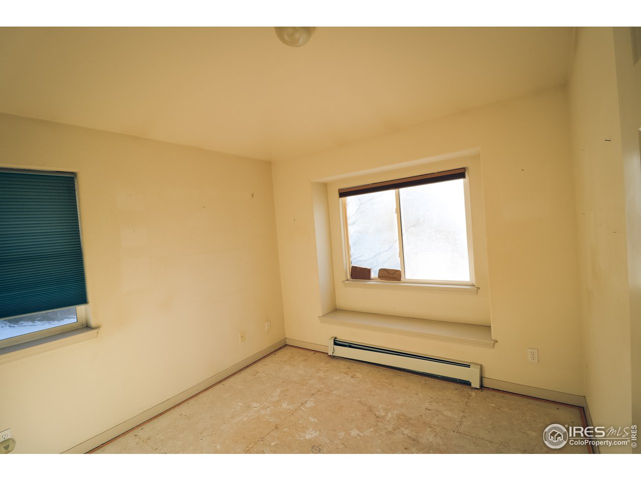 230 South 3rd Street Berthoud, CO 80513 - Photo 15 of 22 a view of an empty room and window