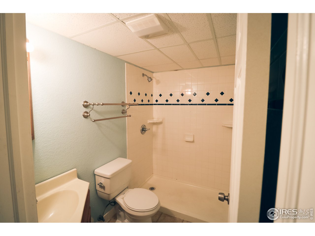 230 South 3rd Street Berthoud, CO 80513 - Photo 17 of 22 a bathroom with a toilet and a shower