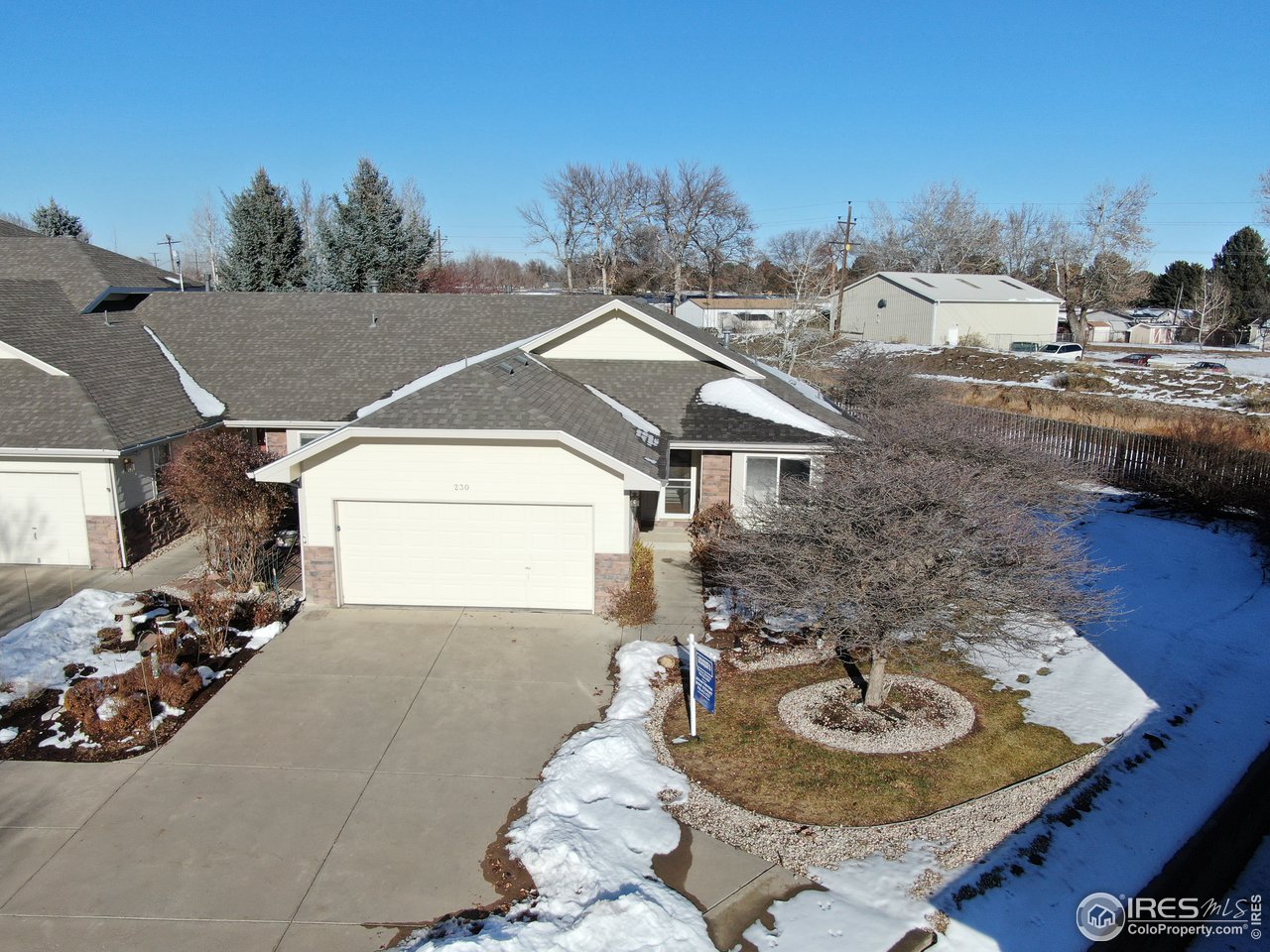 230 South 3rd Street Berthoud, CO 80513 - Photo 3 of 22 a terrace of a house with outdoor seating