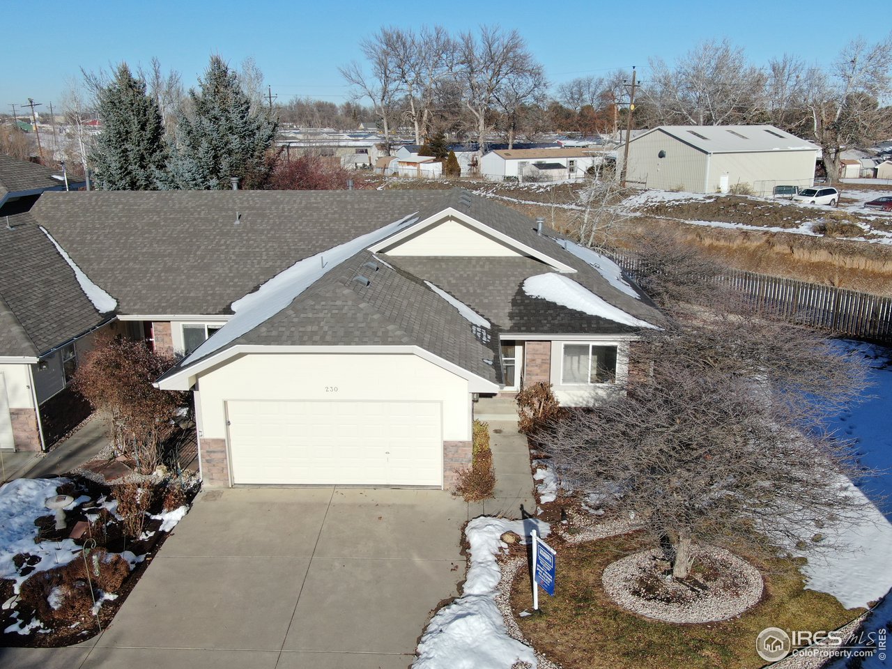 230 South 3rd Street Berthoud, CO 80513 - Photo 4 of 22 a house view with a outdoor space