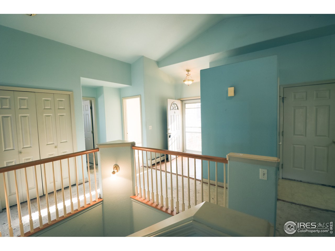 230 South 3rd Street Berthoud, CO 80513 - Photo 5 of 22 a view of a porch with wooden floor