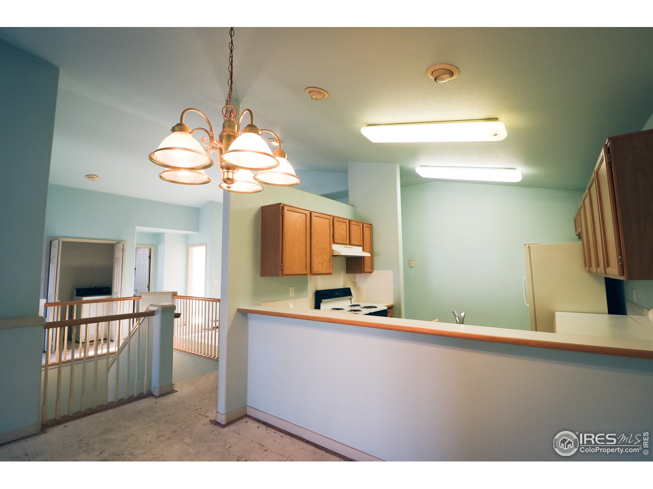 230 South 3rd Street Berthoud, CO 80513 - Photo 6 of 22 a bathroom with a sink a mirror and a light fixture