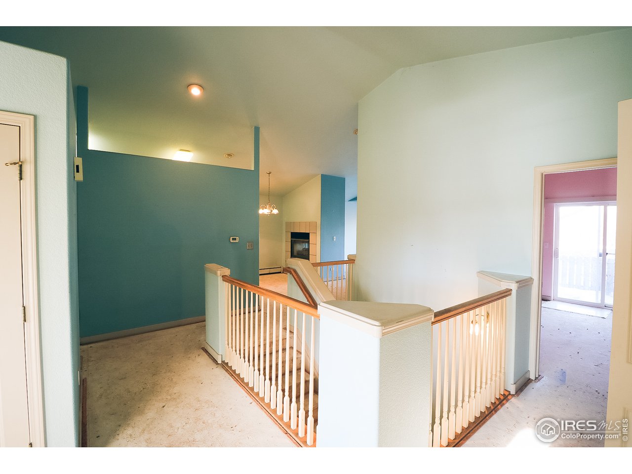 230 South 3rd Street Berthoud, CO 80513 - Photo 9 of 22 a view of a hallway view with staircase
