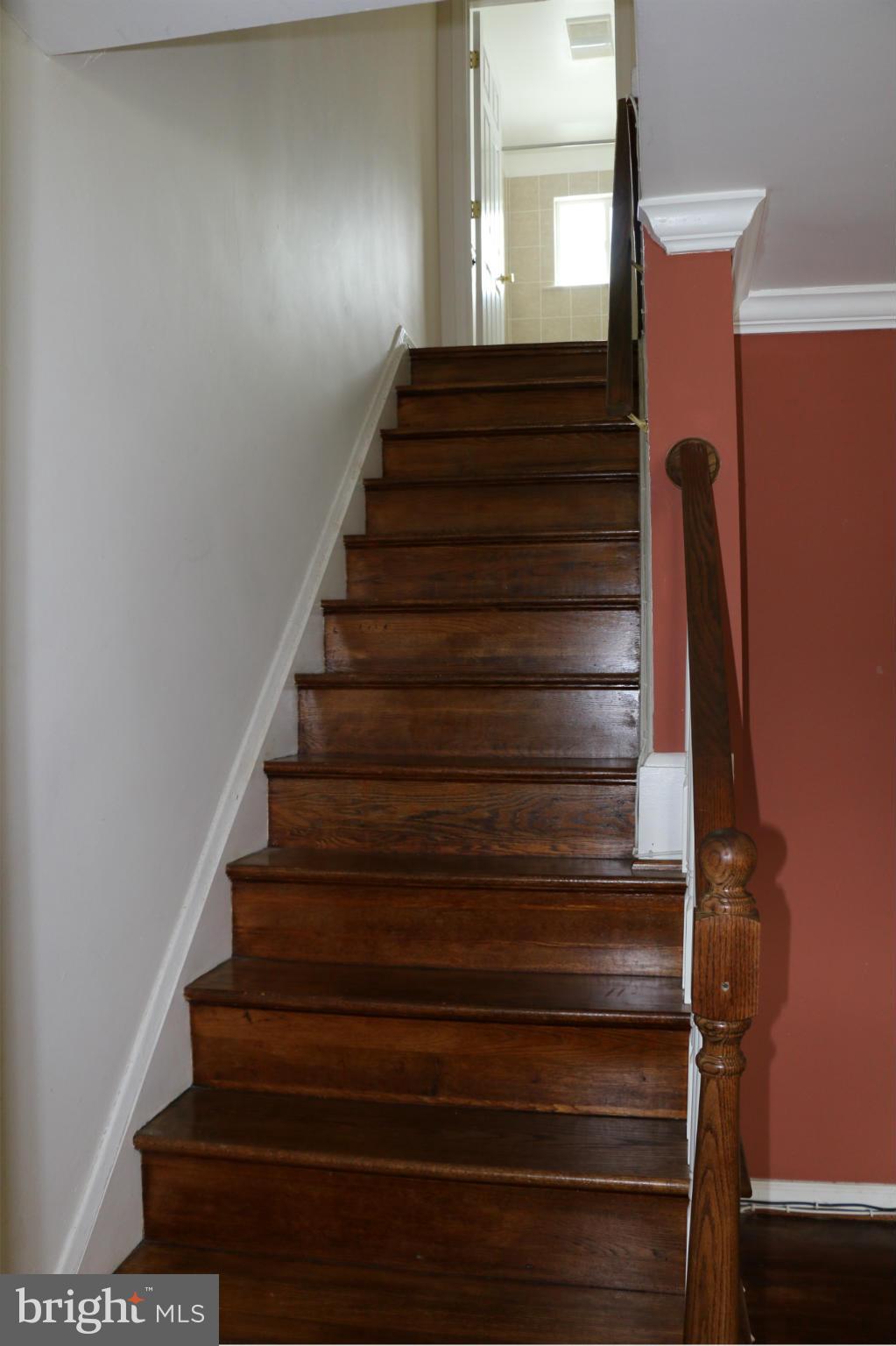287 Southeastern Terrace Baltimore, MD 21221 - Photo 9 of 27 Hardwood stairs