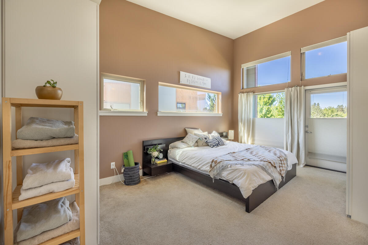 61274 Blakely Road Bend, OR 97702 - Photo 10 of 32 a bedroom with a bed and window
