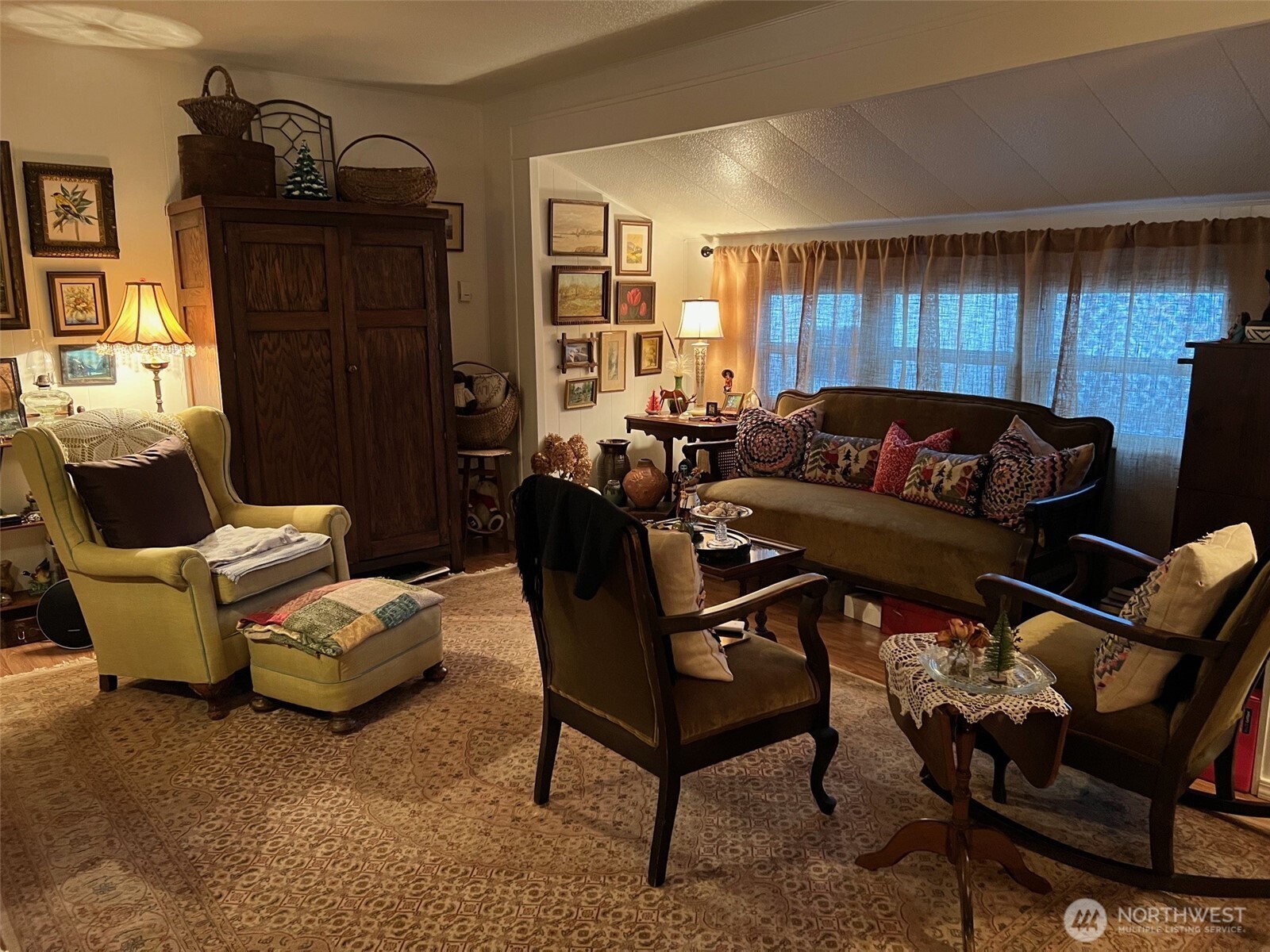 3702 Hunt Street, Unit 23 Gig Harbor, WA 98335 - Photo 2 of 17 a living room with furniture and a window