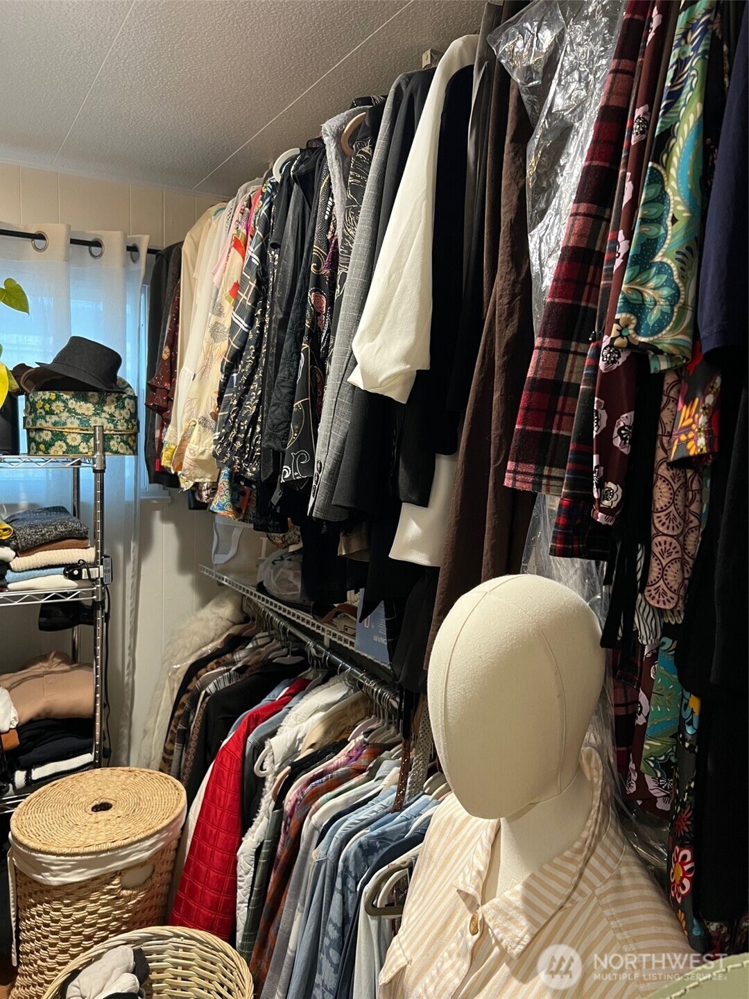 3702 Hunt Street, Unit 23 Gig Harbor, WA 98335 - Photo 10 of 17 a view of walk in closet with clothes and shoes