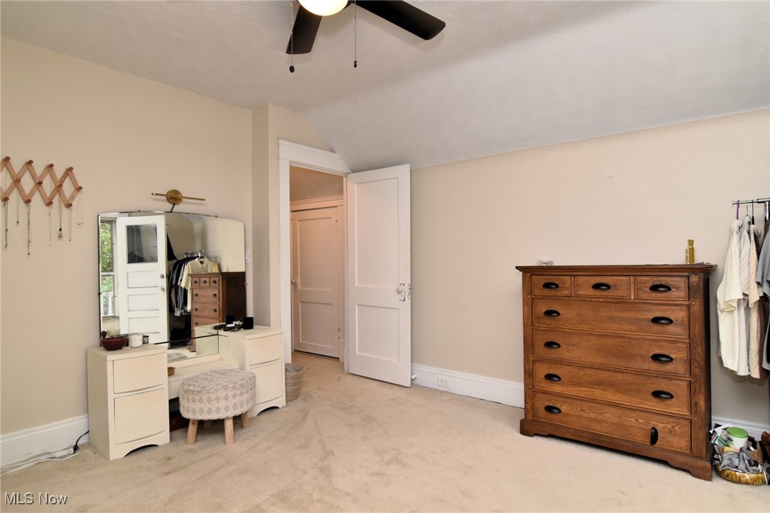 13048 Cedar Road Cleveland, OH 44118 - Photo 25 of 40 Bedroom featuring vaulted ceiling, light carpet, and ceiling fan