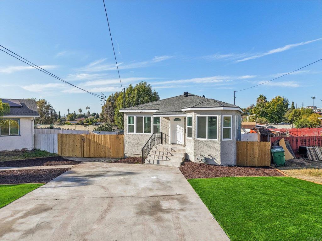 5412 Cervantes Avenue San Diego, CA 92114 - Photo 1 of 28 a view of a house with a yard