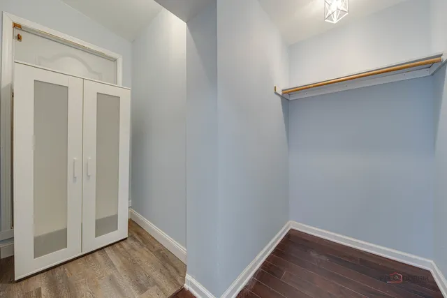 a view of small space with wooden floor