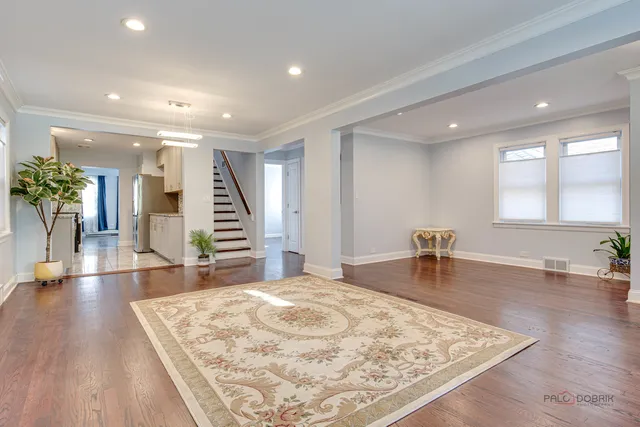 a view of a living room and dining room