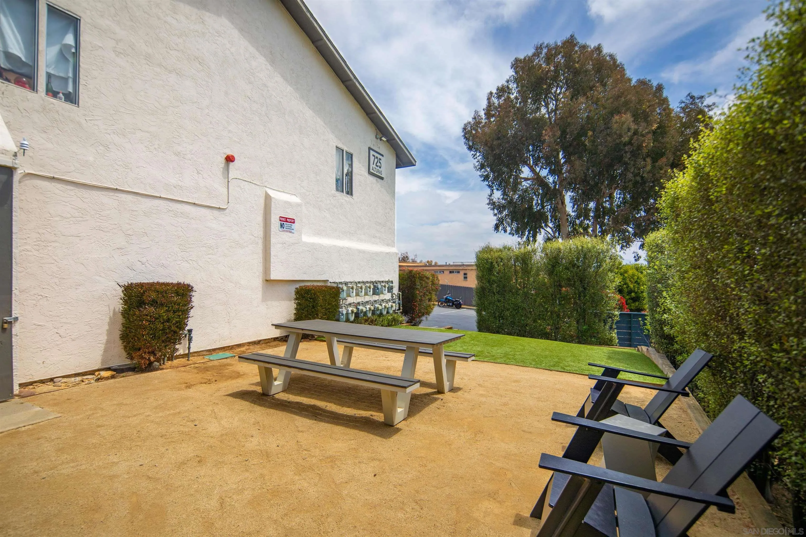725 Alturas Lane Fallbrook, CA 92028 - Photo 15 of 34 a view of a lounge chairs in back yard of the house