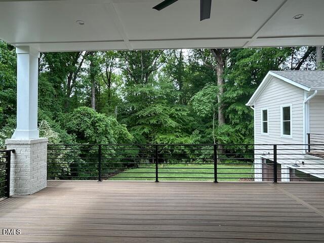 2817 Claremont Road Raleigh, NC 27608 - Photo 12 of 73 a view of a house with a yard