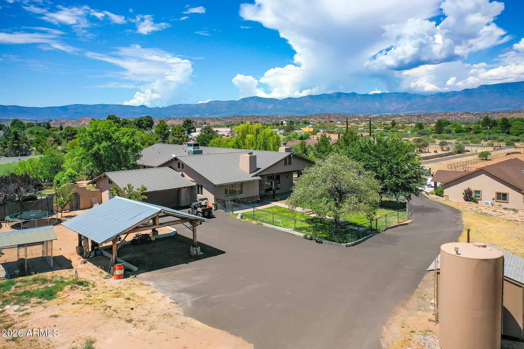 1005 South Page Springs Road Cornville, AZ 86325 - Photo 18 of 43 an aerial view of a house with outdoor space