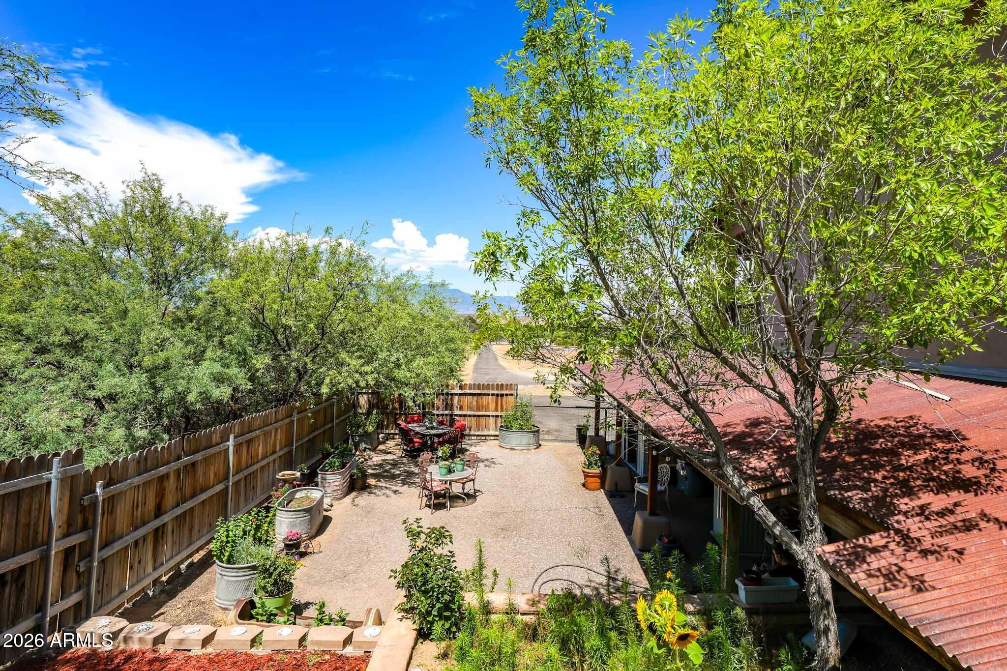 1005 South Page Springs Road Cornville, AZ 86325 - Photo 22 of 43 a view of a pathway of a house with a yard