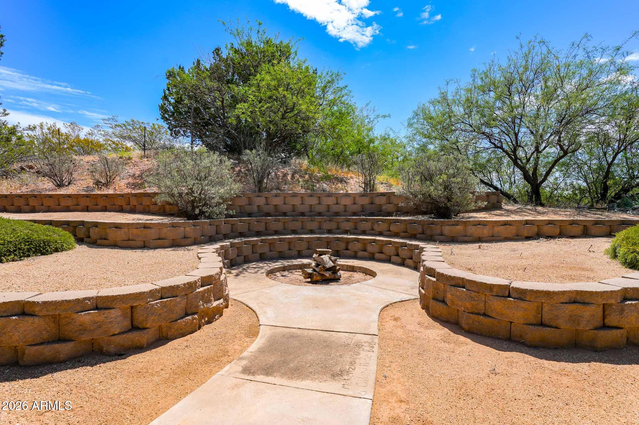 1005 South Page Springs Road Cornville, AZ 86325 - Photo 24 of 43 a view of a swimming pool with a yard