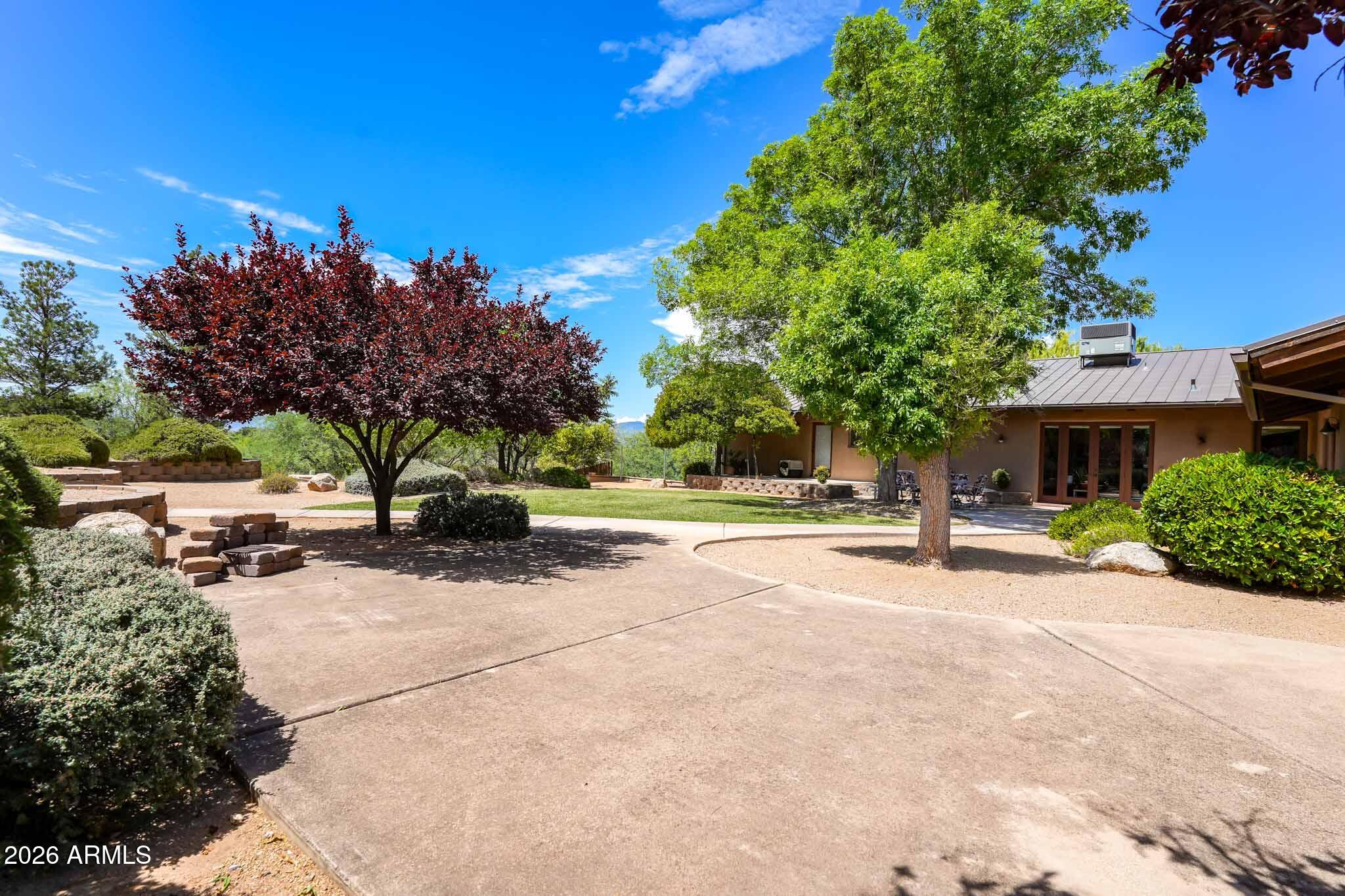 1005 South Page Springs Road Cornville, AZ 86325 - Photo 26 of 43 a view of a house with tree s